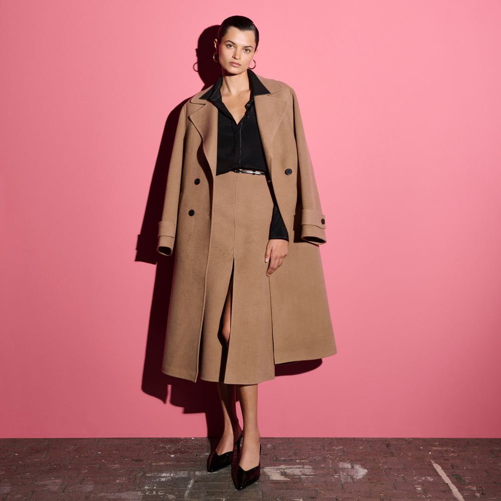 front image of a woman wearing the viola coat in camel