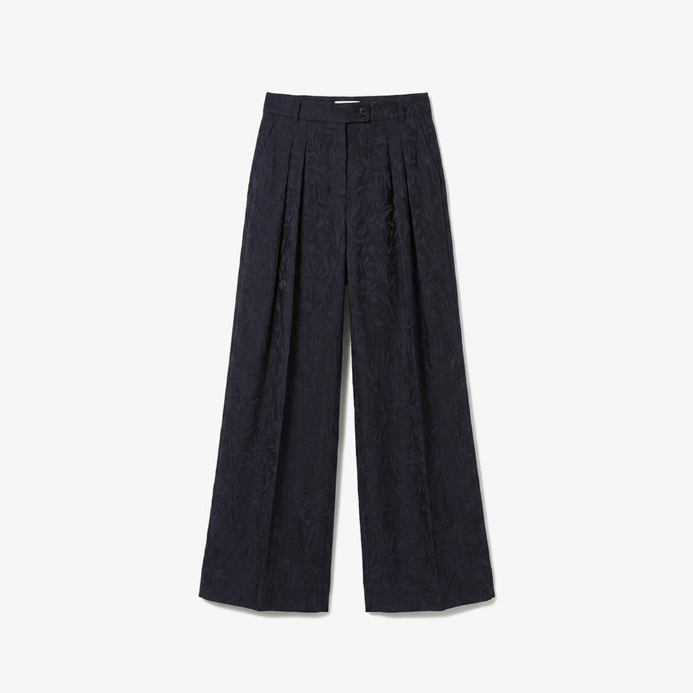 Black wide-leg pants on a light gray background