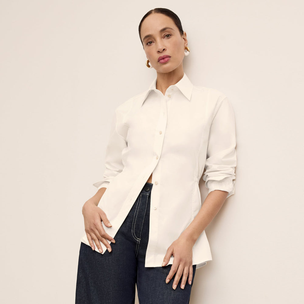 front image of a woman wearing the bentley shirt in eggshell