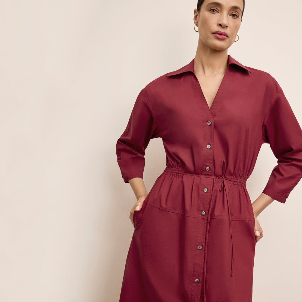front image of a woman wearing the boden dress in cinnabar