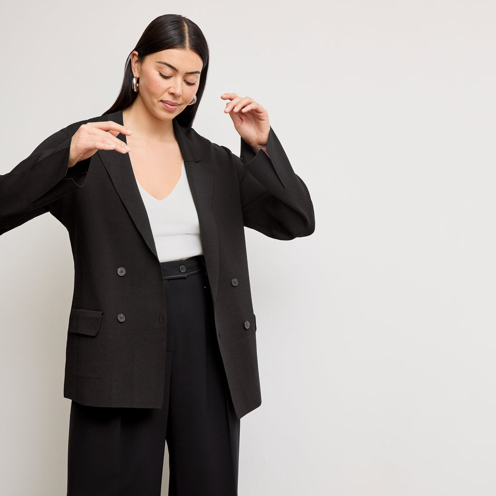 front image of a woman wearing the cody jardigan in black