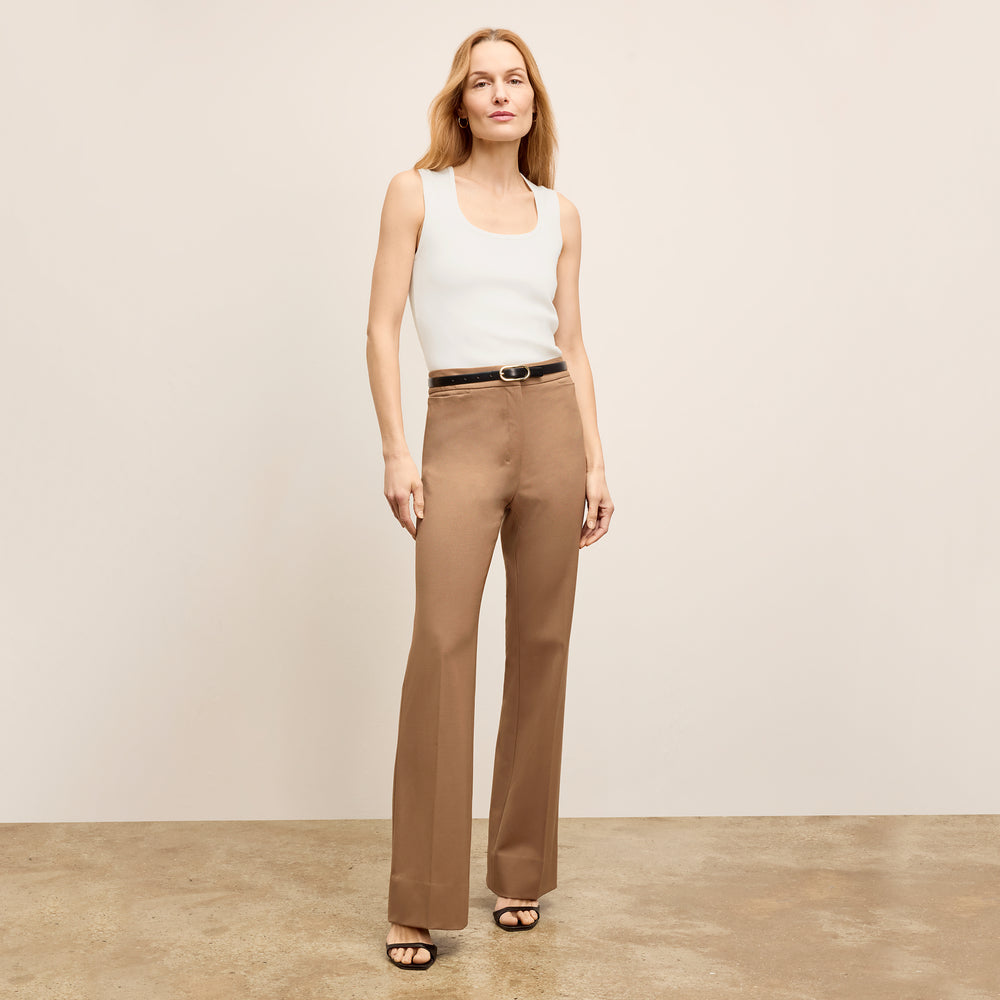 front image of a woman wearing the horton pants in saddle