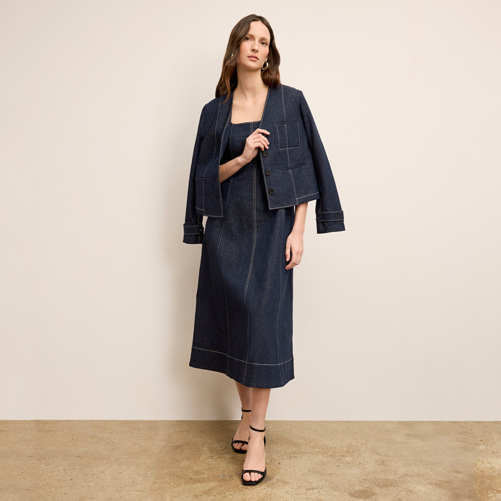 front image of a woman wearing the kenna dress in midnight wash