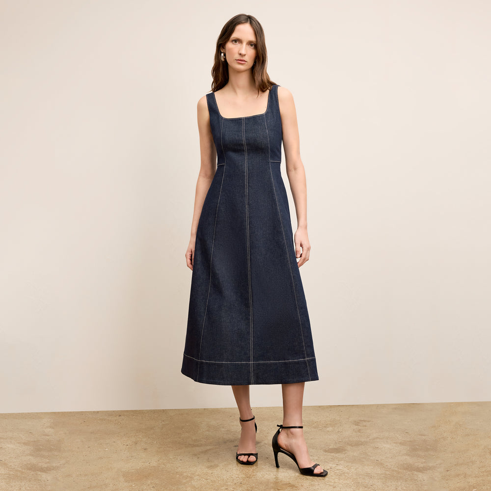 front image of a woman wearing the kenna dress in midnight wash