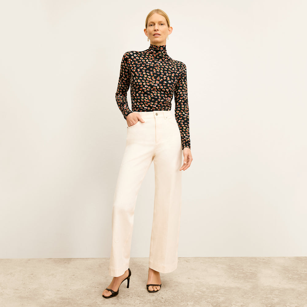 Front image of a woman wearing the Milo Jean in Tusk