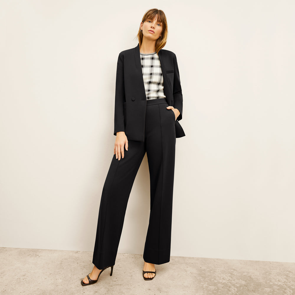 front image of a woman wearing the jordan trouser in black