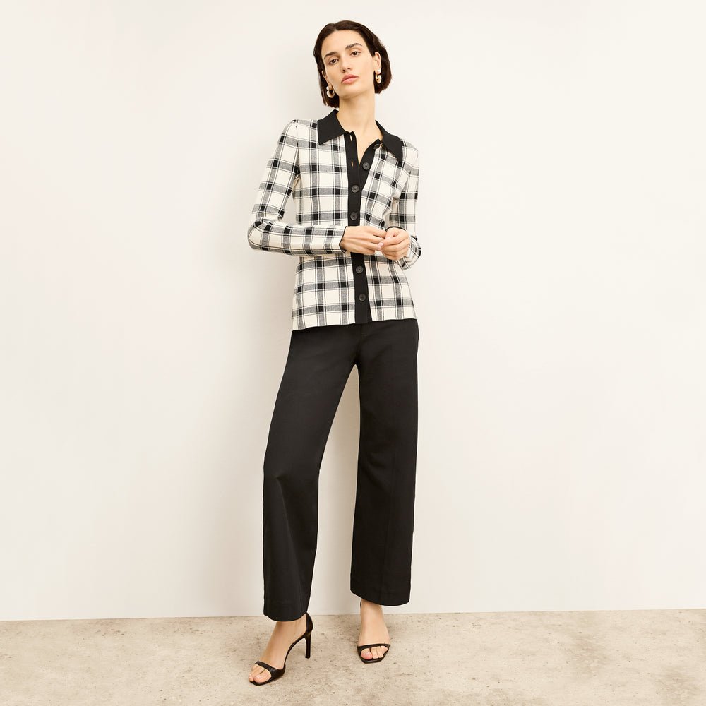 Front image of a woman wearing the Lacie top