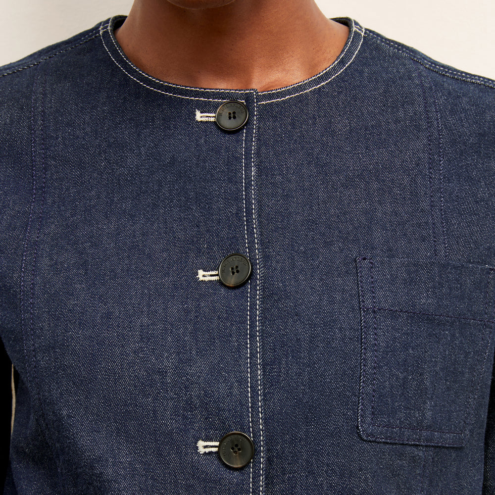 detail image of a woman wearing the kane jacket in dark wash