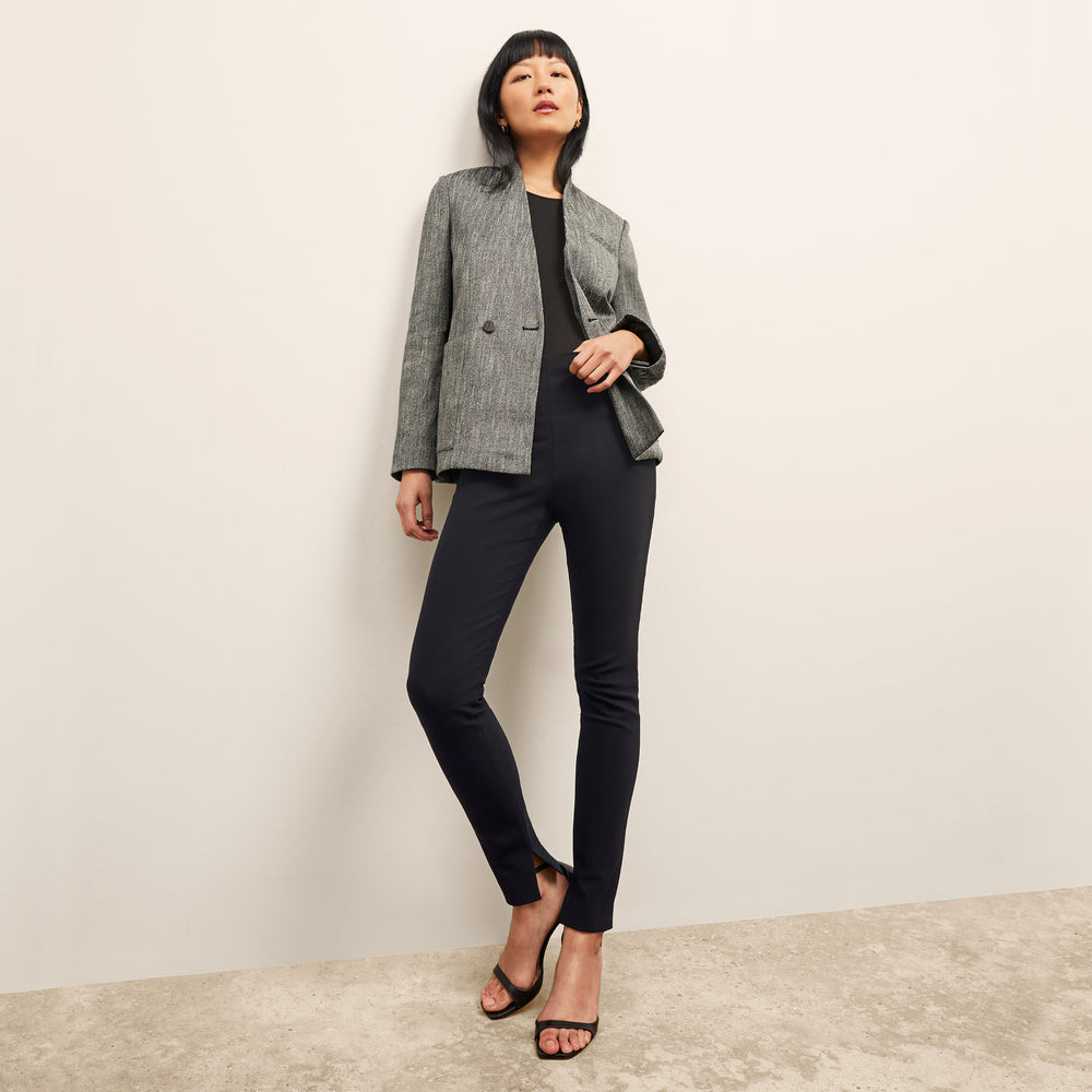 front image of a woman wearing the janette jacket in black/ivory