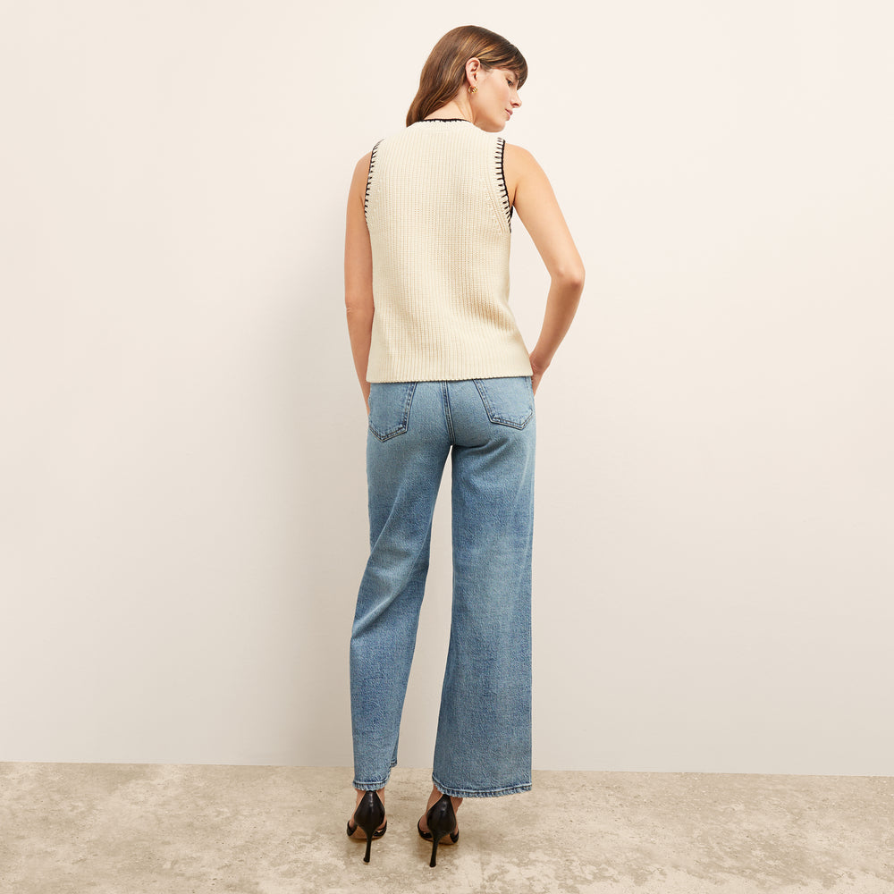 Back image of a woman wearing the Frame Le Pixie Jane Wide Leg in Lomina Lmna