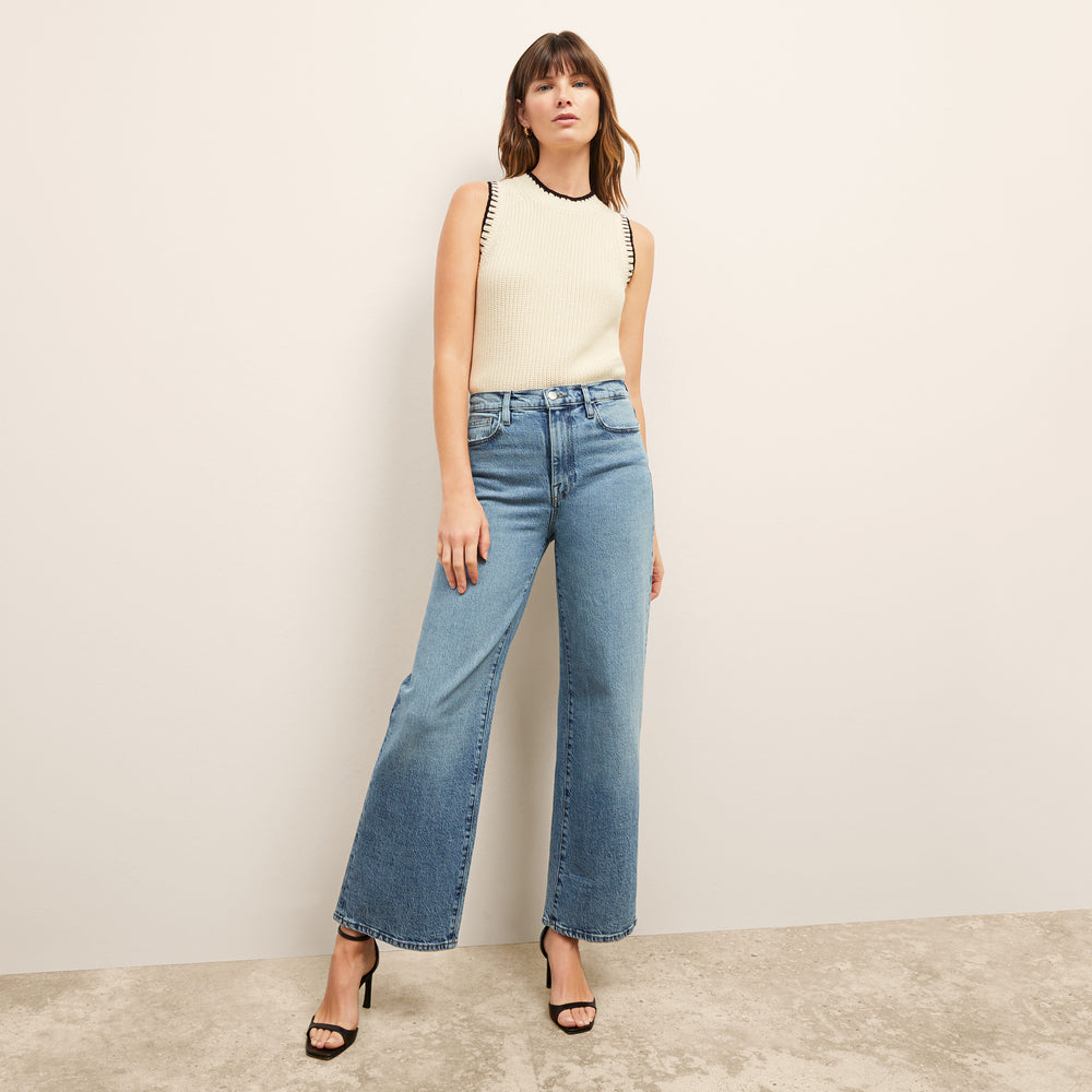 Front image of a woman wearing the Frame Le Pixie Jane Wide Leg in Lomina Lmna