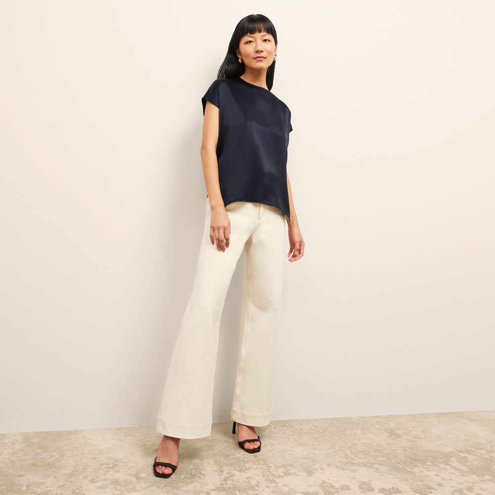 Front image of a woman wearing the Didion Top in Galaxy Blue