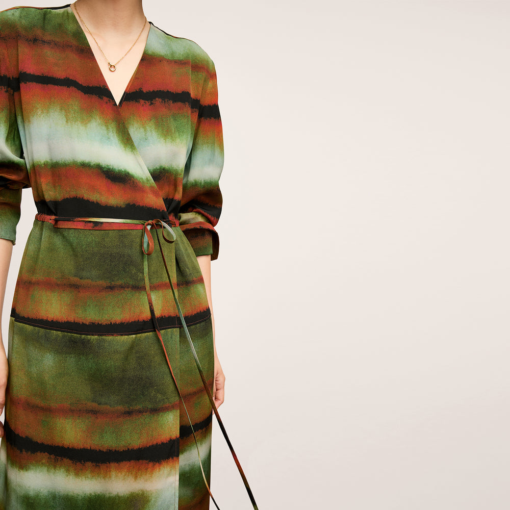 Front image of a woman wearing the Deana dress in Faded Print