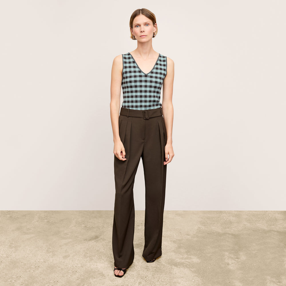 front image of a woman wearing the peggy top in picnic check