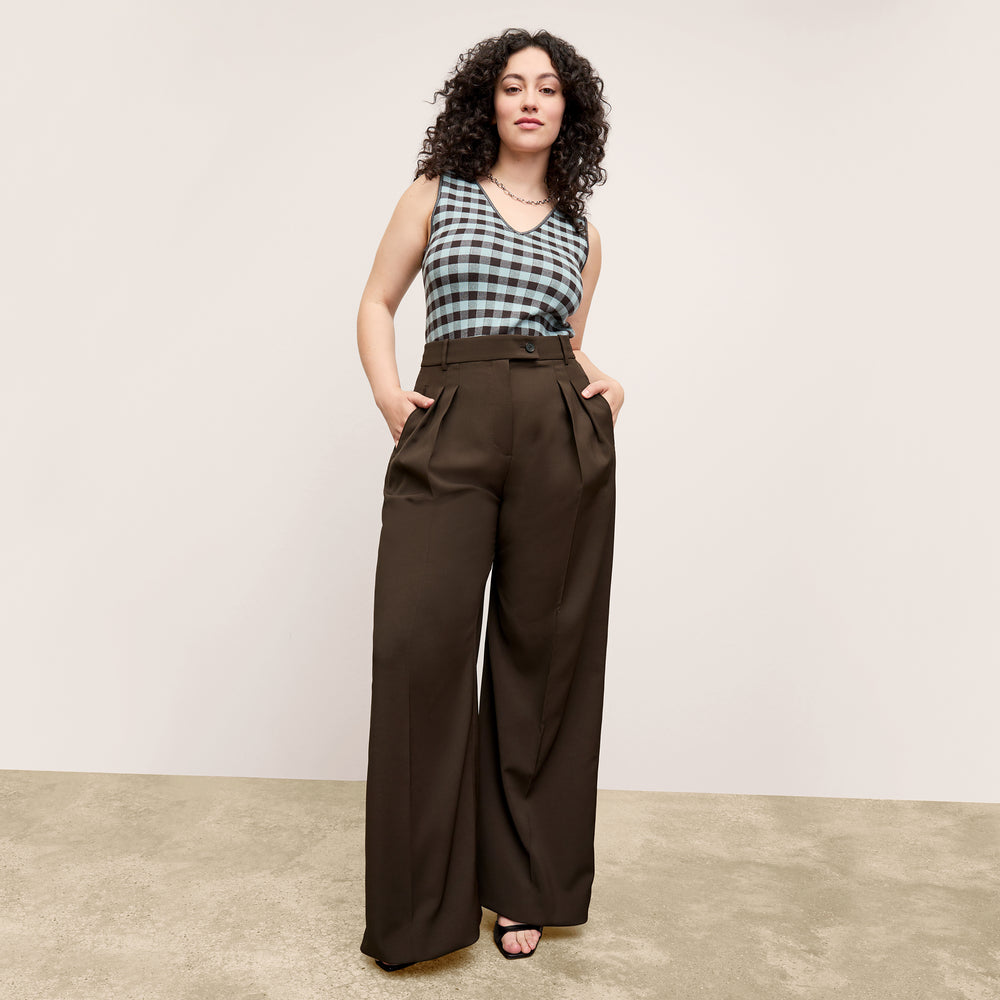 front image of a woman wearing the peggy top in picnic check