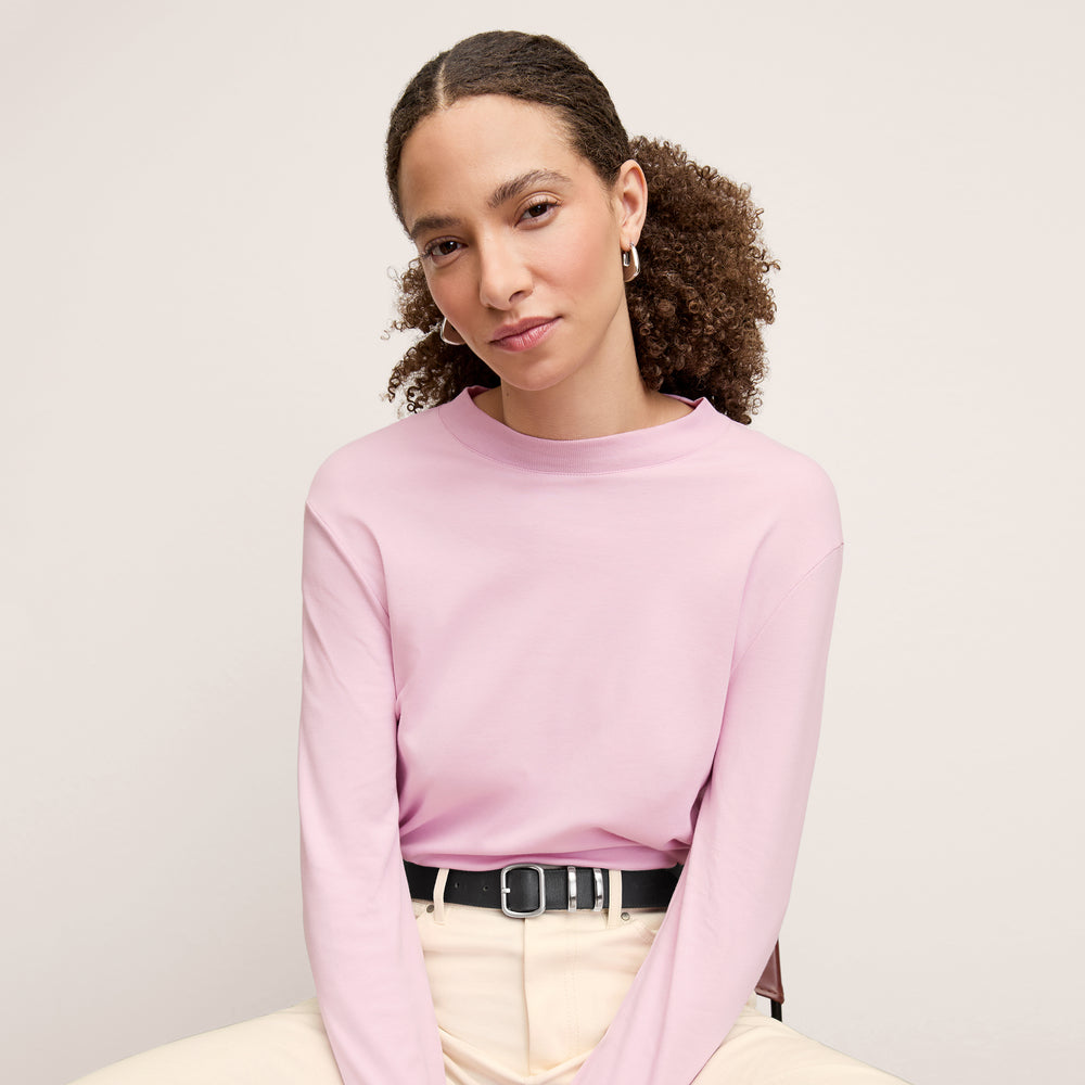 front image of a woman wearing the raquel top in hyacinth