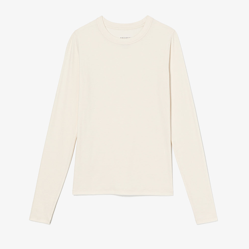 White long-sleeve shirt on a light gray background