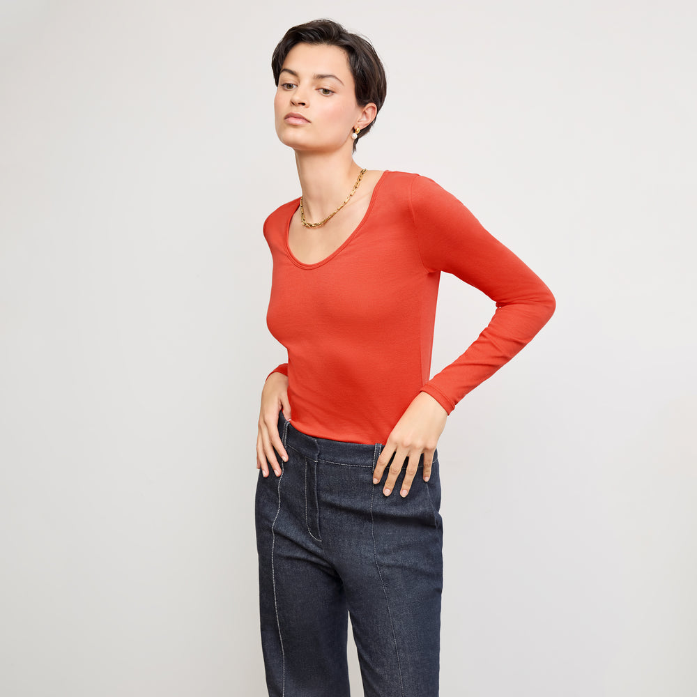 front image of a woman wearing the marcia shirt in marmalade