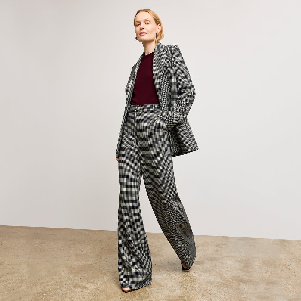 front image of a woman wearing the Tinsley Trousers in Classic Check