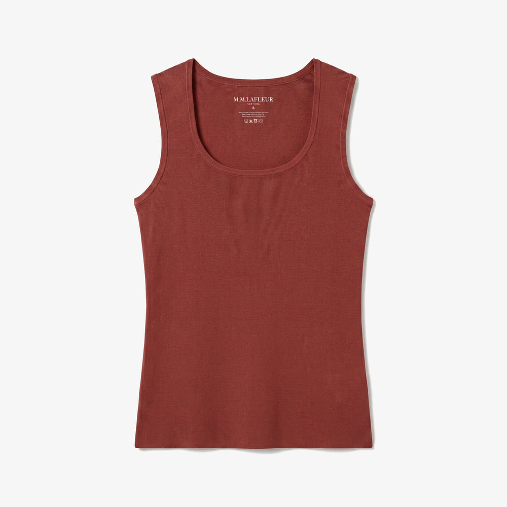 A rust-colored ribbed tank top, shown flat against a light gray background.