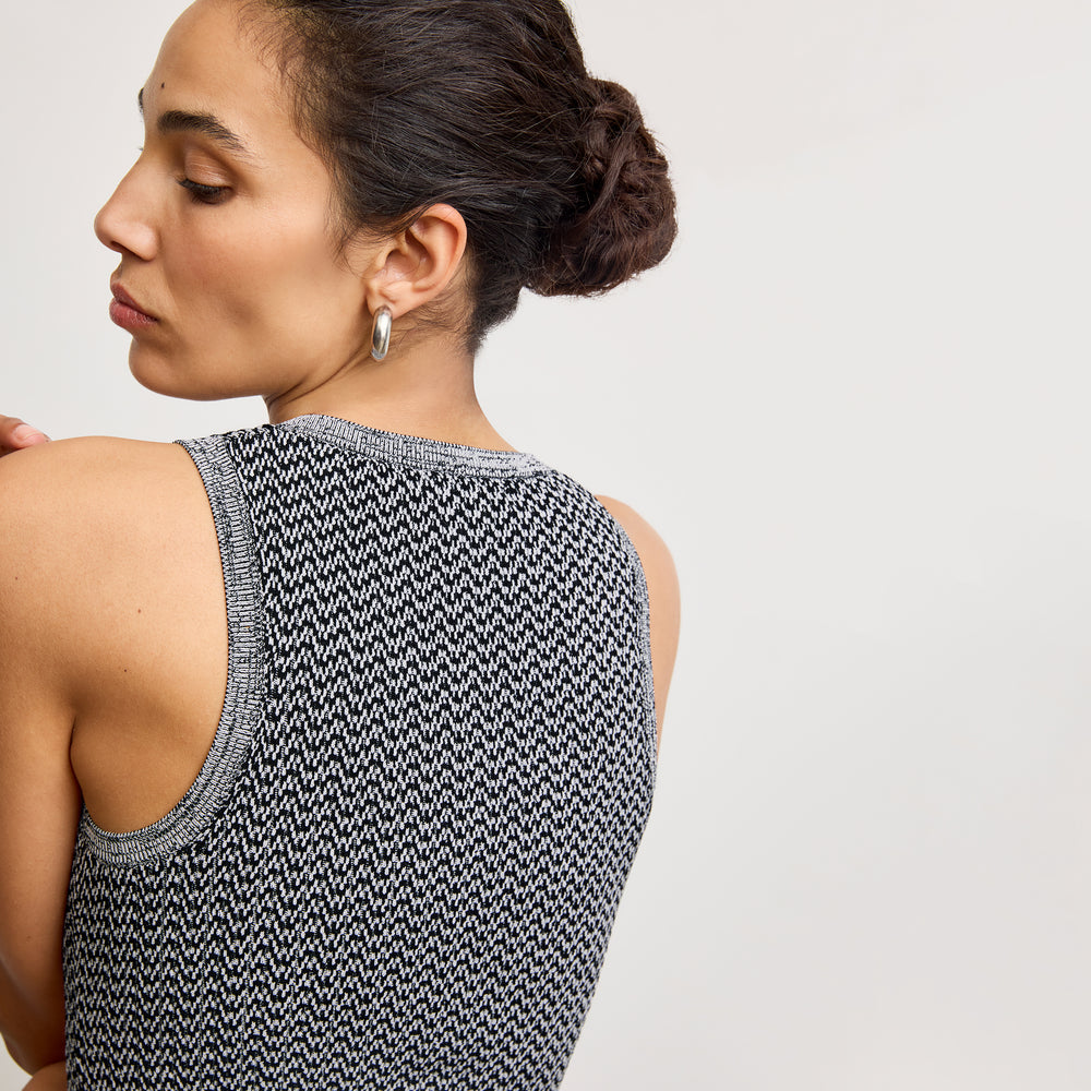 back image of a woman wearing the sonny top in mini chevron knit