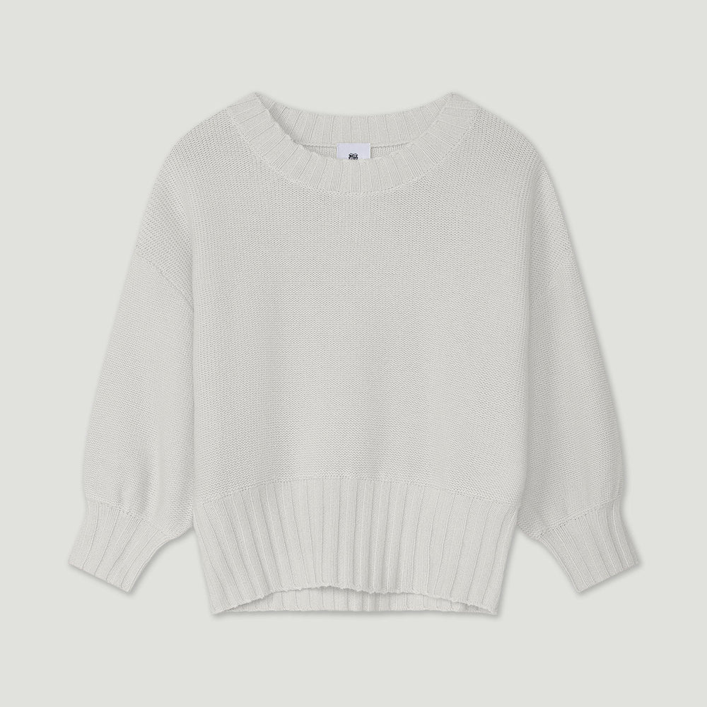 Light gray sweater on a light gray background