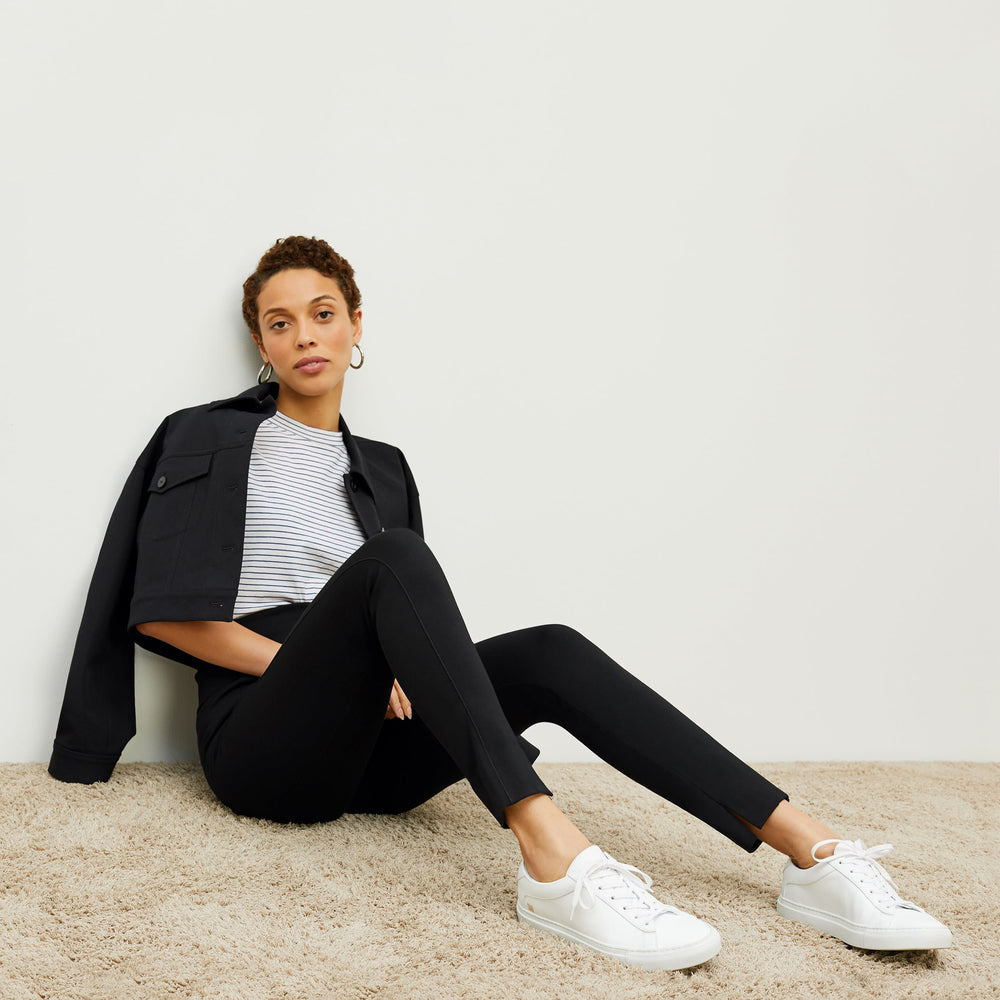 image of woman wearing M.M.LaFleur x Koio Capri Low-Top SneakersāLeather White