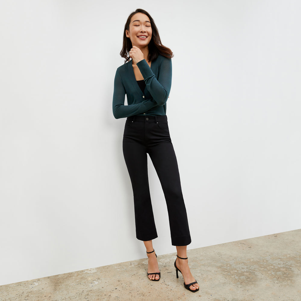 Front image of a woman wearing the Rory Cardigan - Silk Jersey in Deep Sea