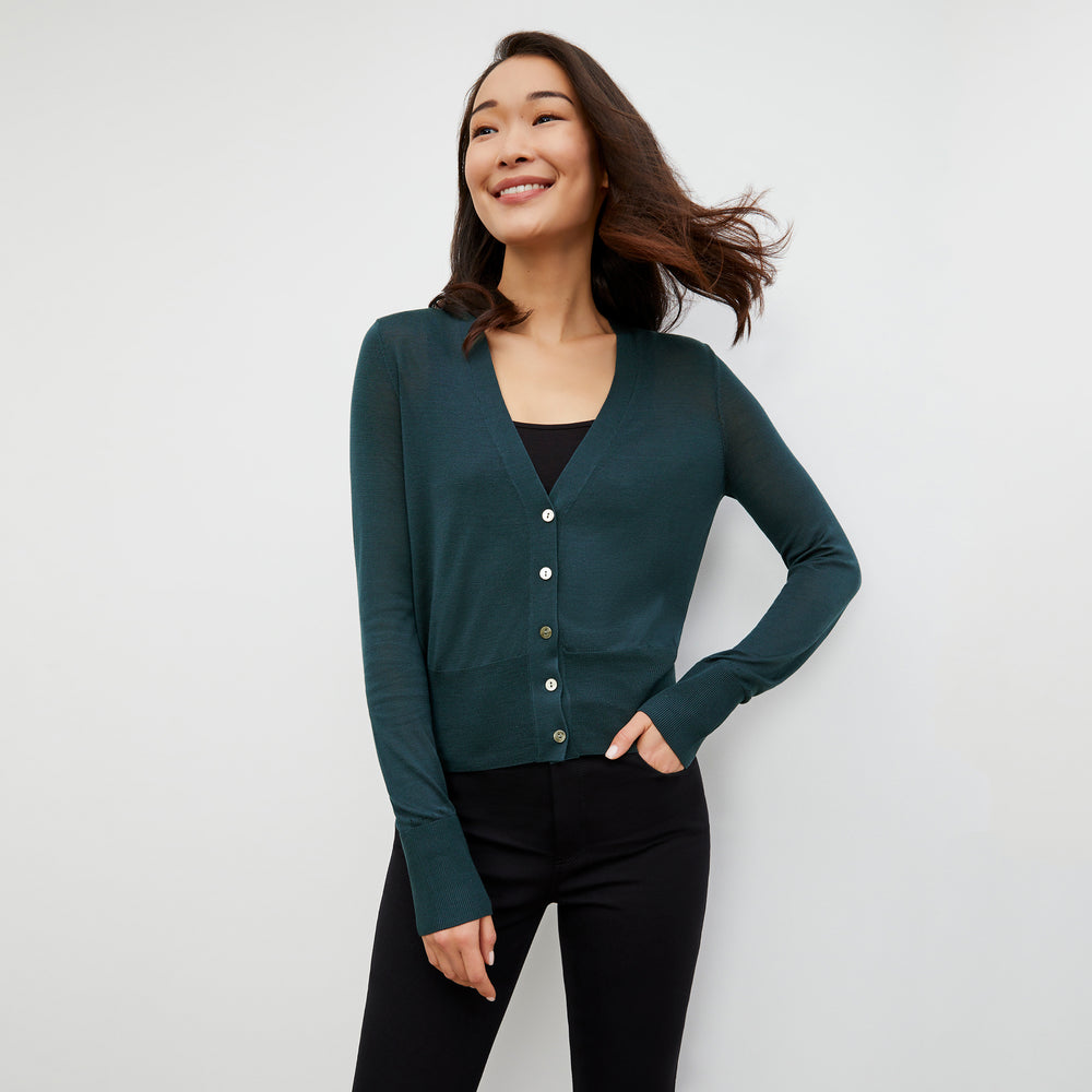 Front image of a woman wearing the Rory Cardigan - Silk Jersey in Deep Sea