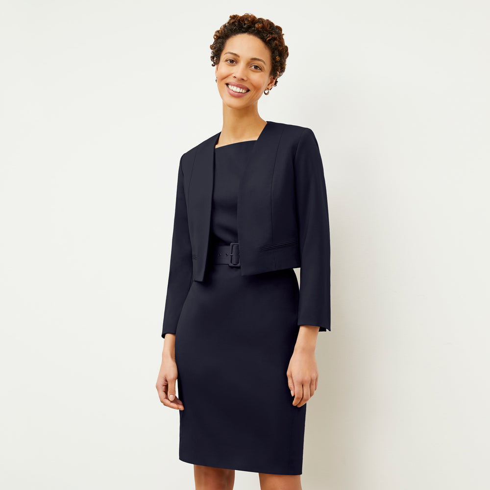Front image of a woman wearing the Cynthia dress in Galaxy Blue