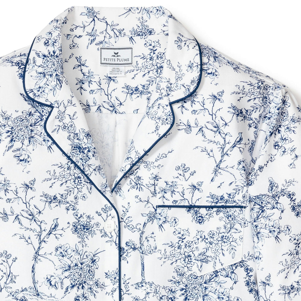Floral pajama set with blue details on a white background