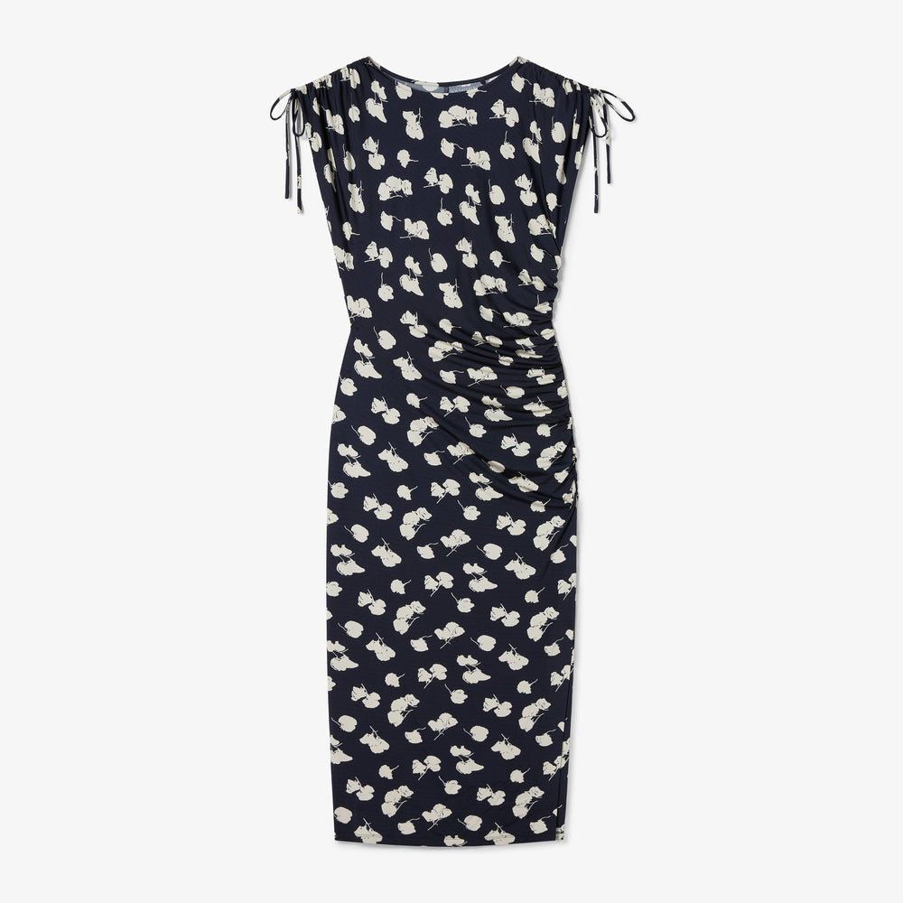 Navy dress with white floral pattern on a white background