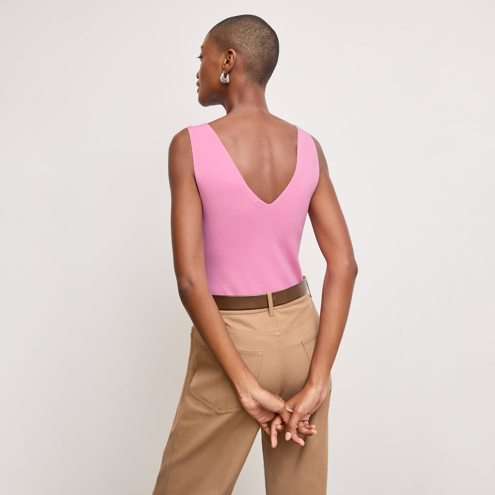 back image of a woman wearing the alecia top in lotus