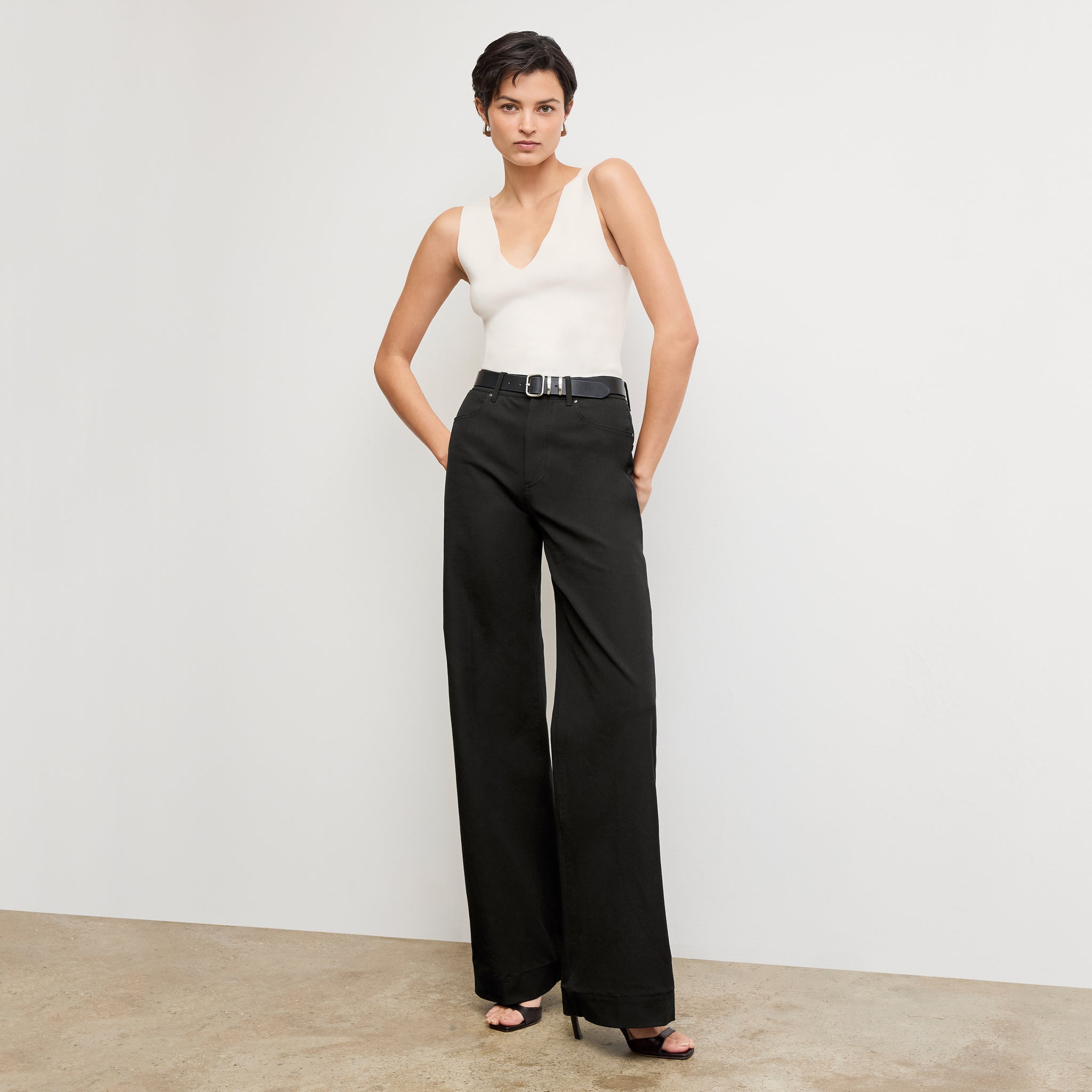 Front image of a woman wearing the Milo Jean in Black