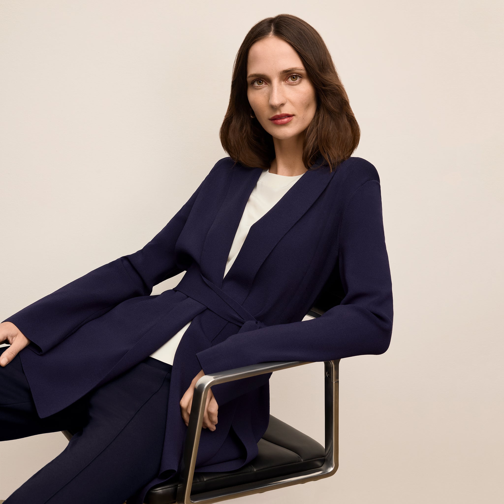 image of a woman wearing the merritt jardigan in navy