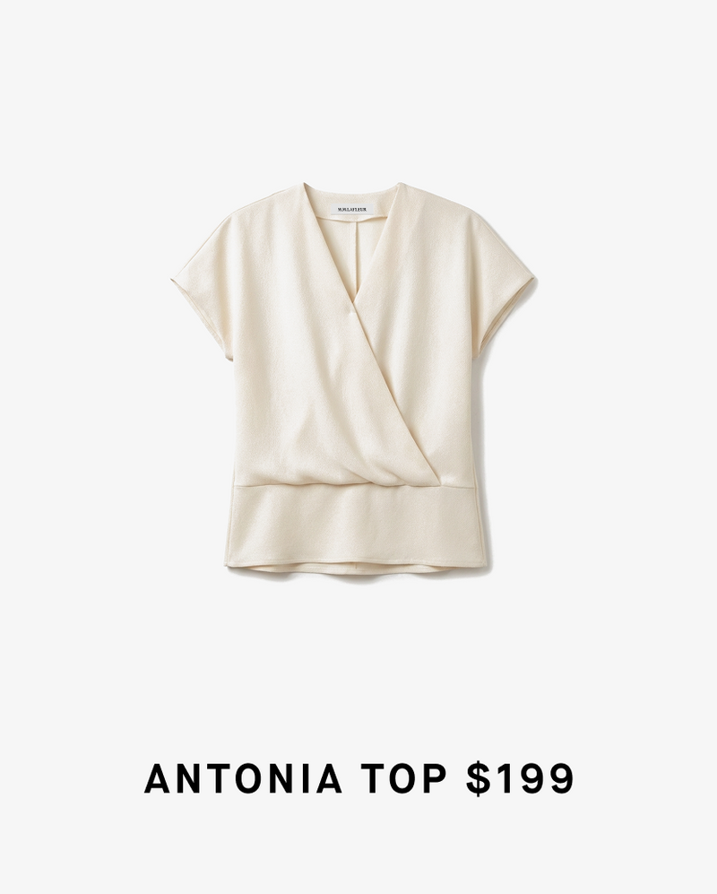 Beige top with a draped design on a white background, labeled 'Antonia Top $199'.