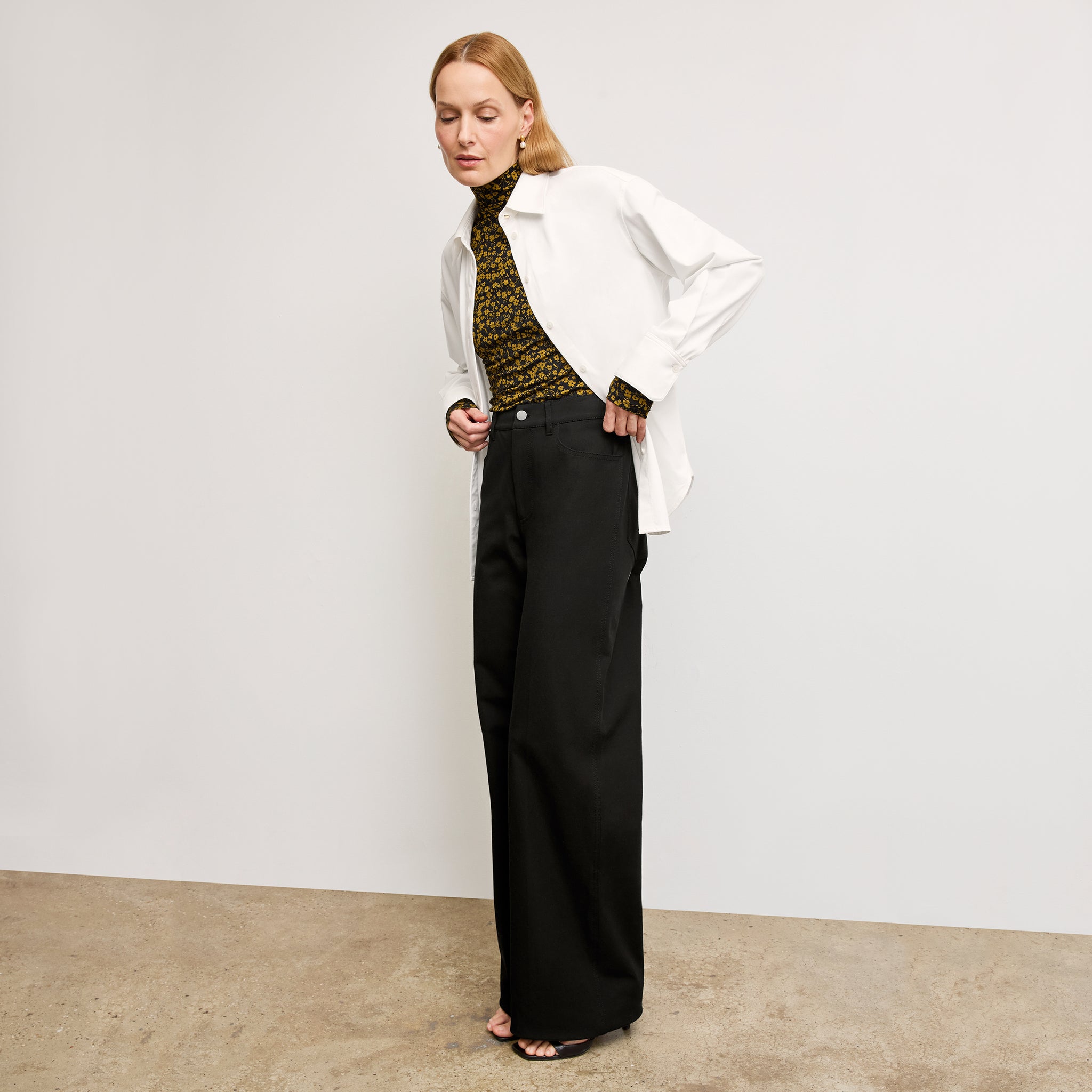 Front image of a woman wearing the Milo Jean in Black