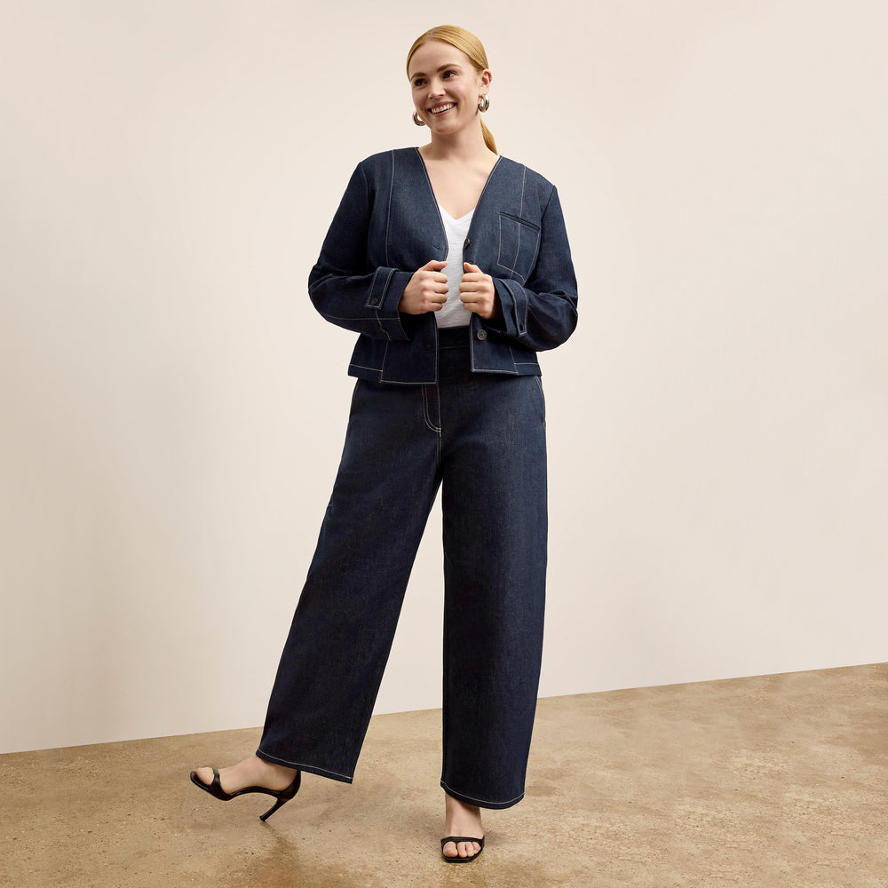 front image of a woman wearing the ayla jacket in midnight wash