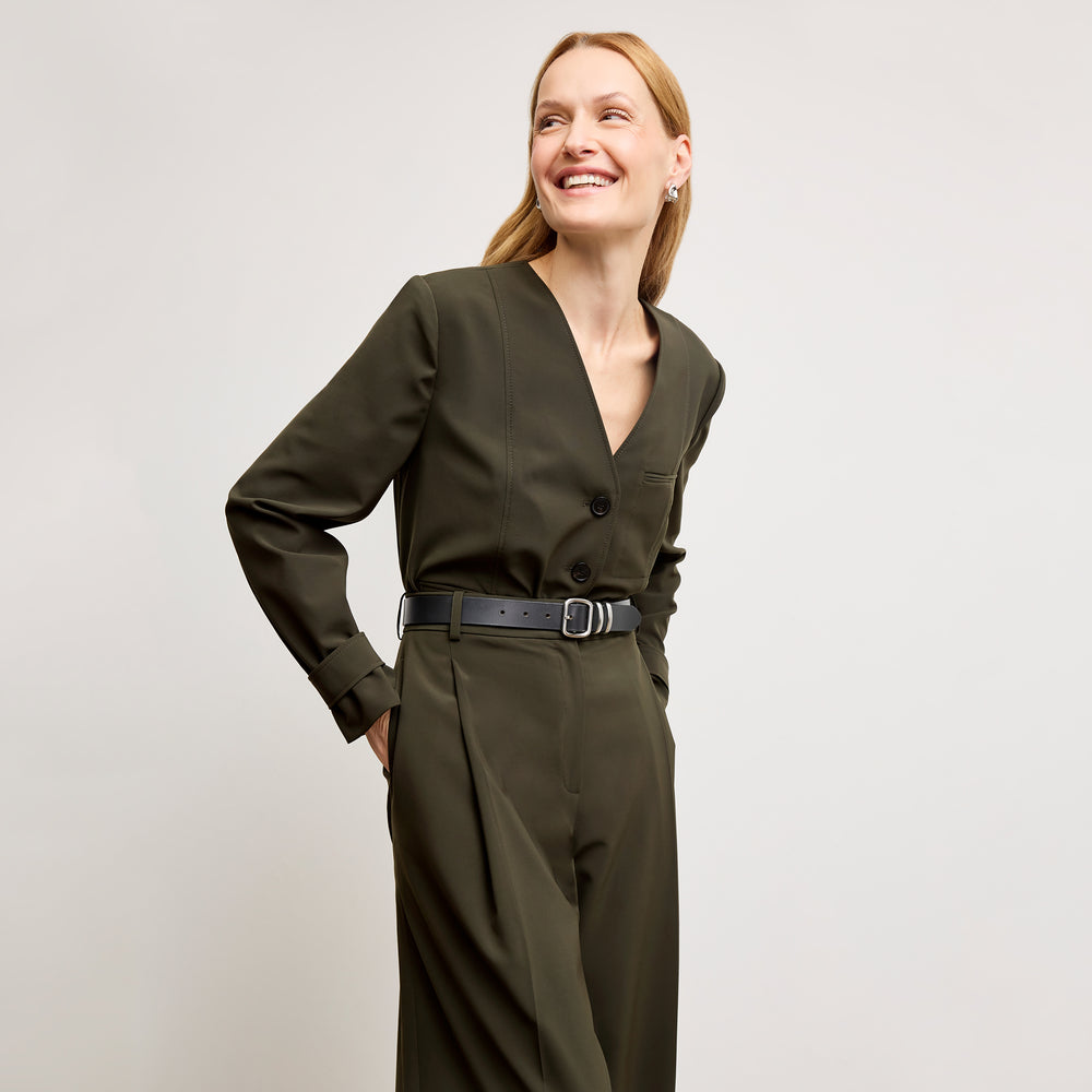 Front image of a woman wearing the Ayla Jacket in Olive