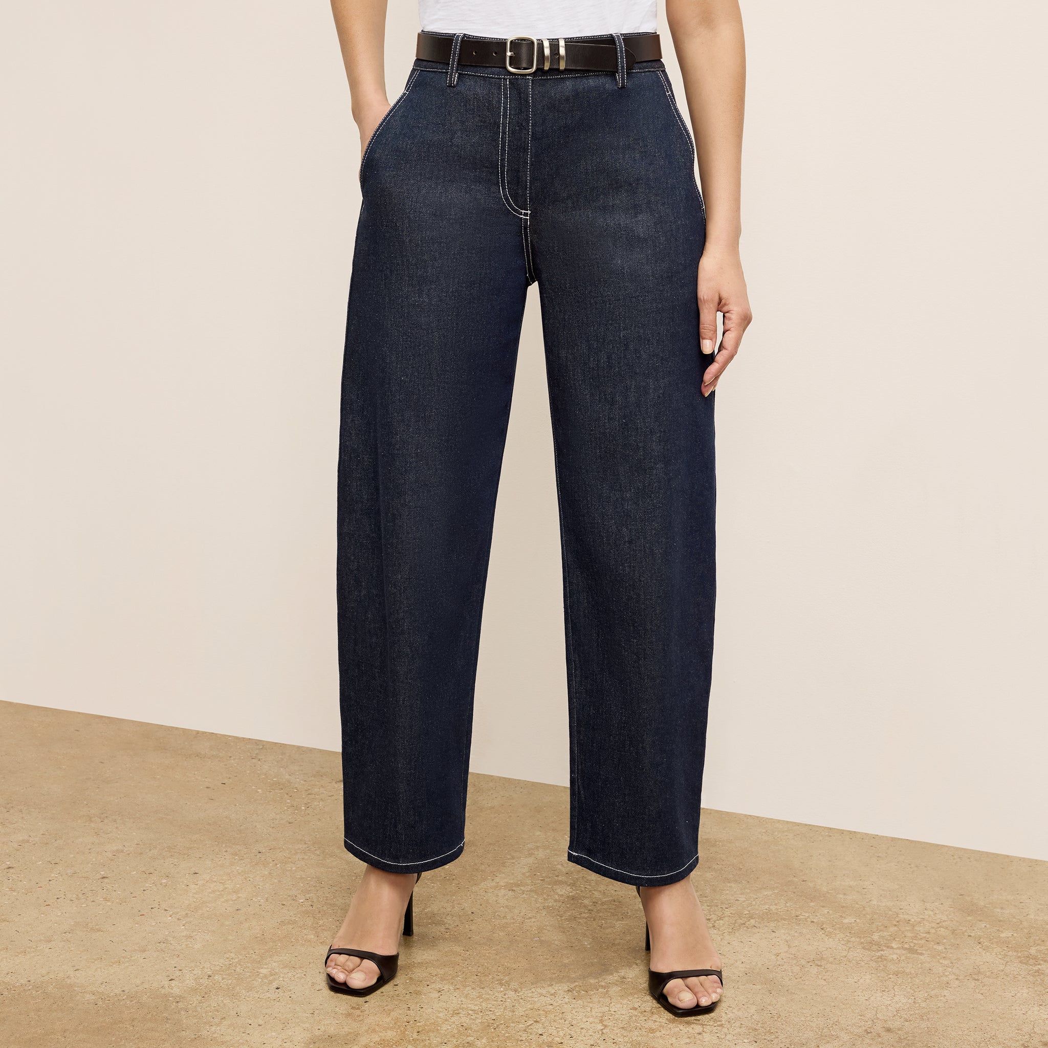 front image of a woman wearing the bari jean in midnight wash 