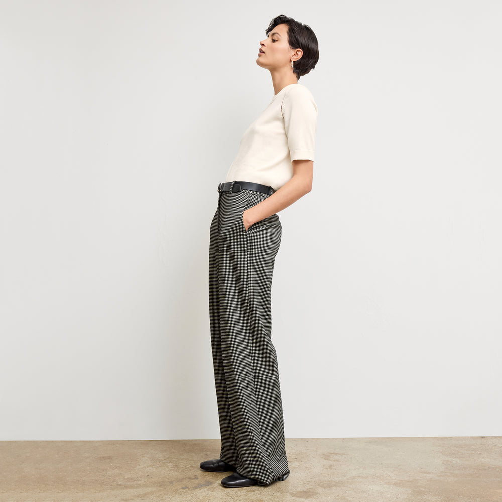 side image of a woman wearing the becca top in ivory