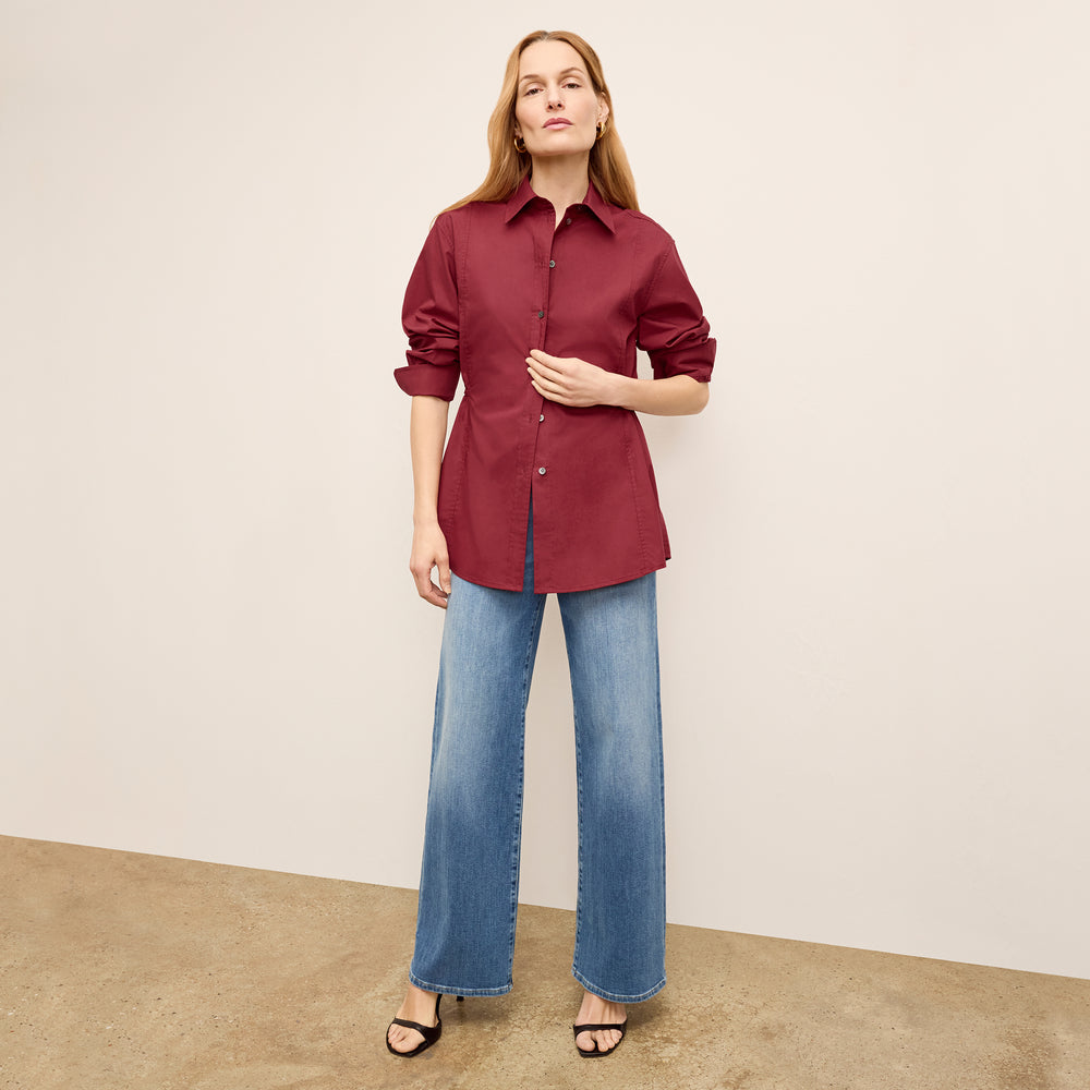 front image of a woman wearing the bentley shirt in cinnabar