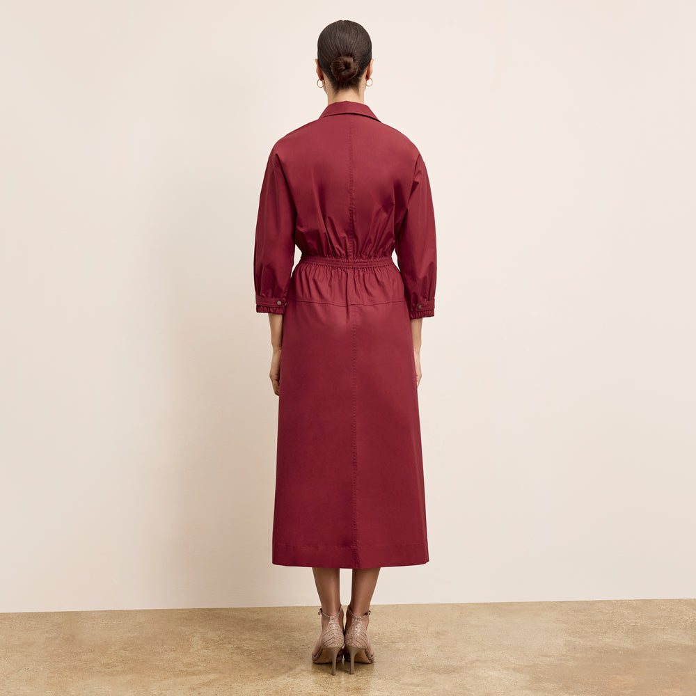 back image of a woman wearing the boden dress in cinnabar