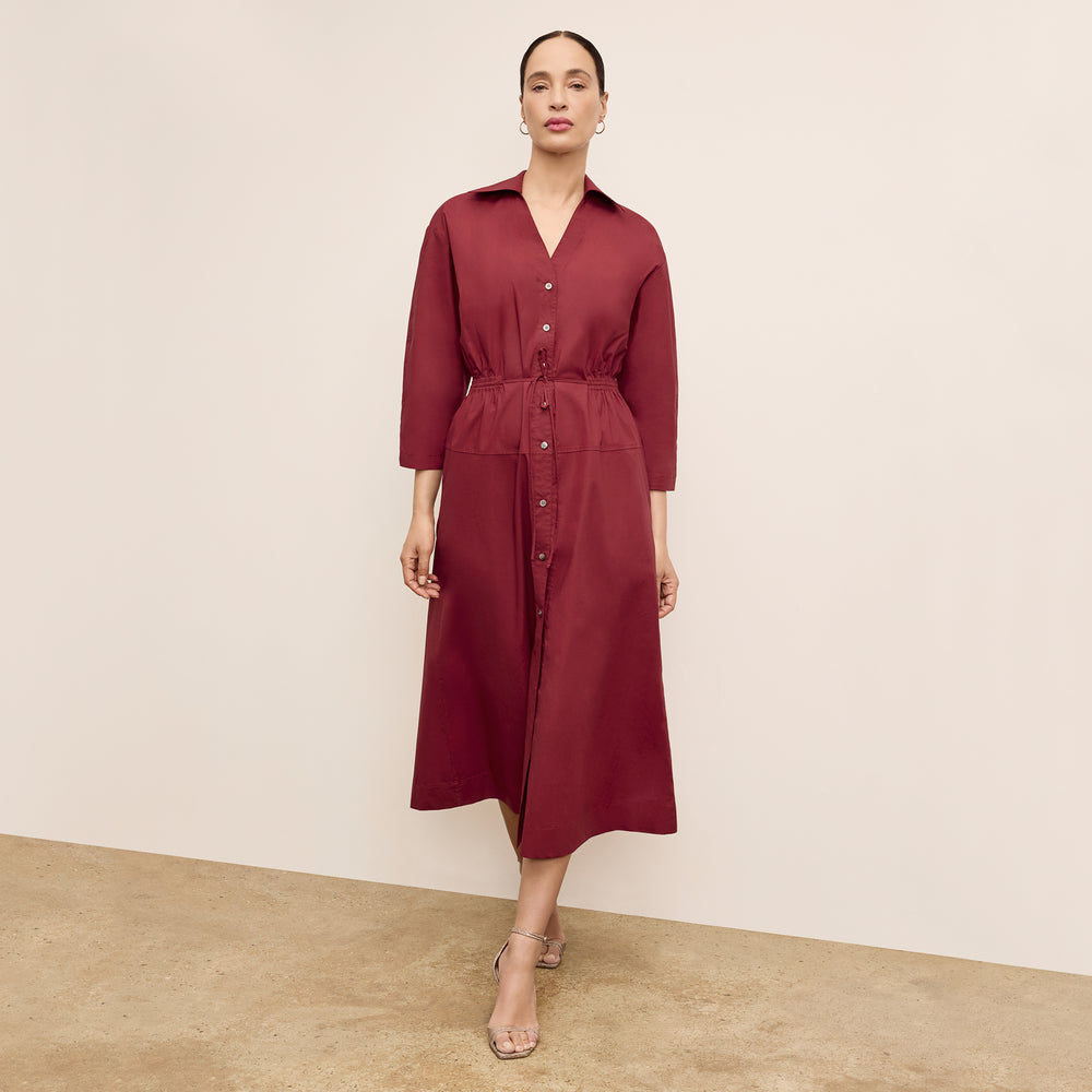 front image of a woman wearing the boden dress in cinnabar