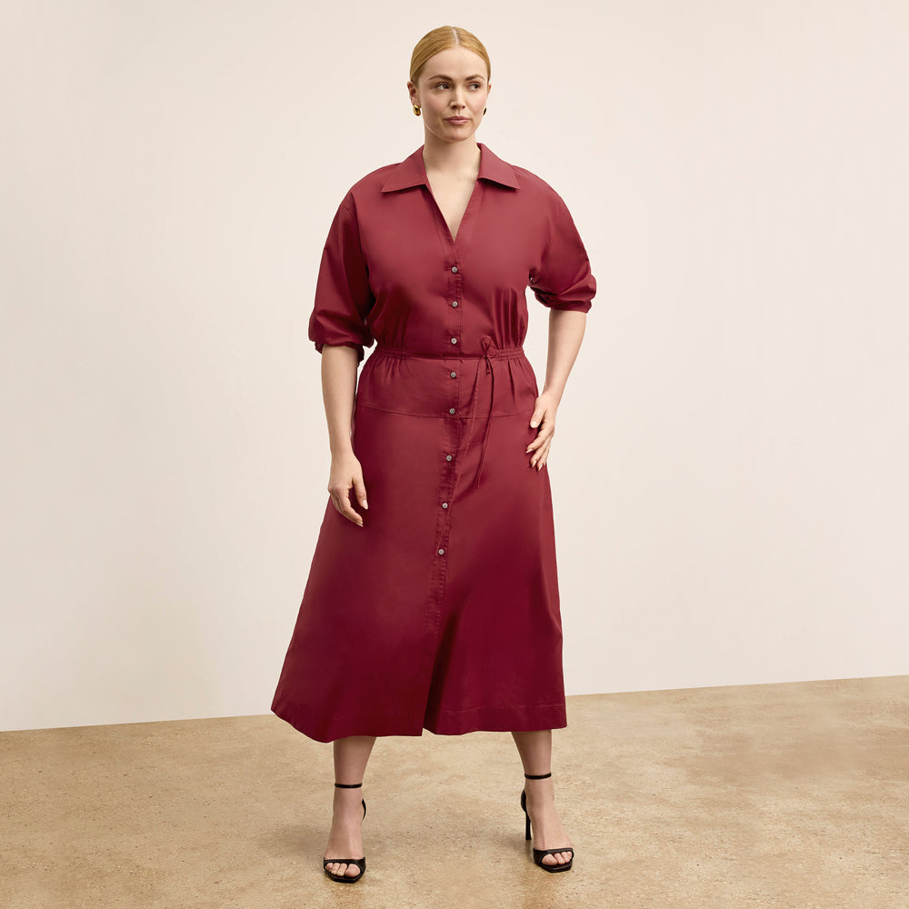 front image of a woman wearing the boden dress in cinnabar