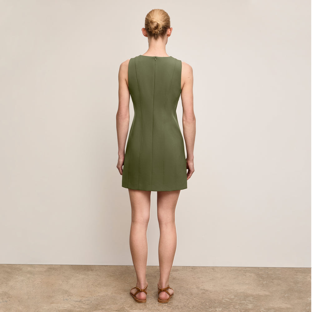 Backimage of a woman wearing 
The Carolina Dress-Flex Suiting :: Bright Olive