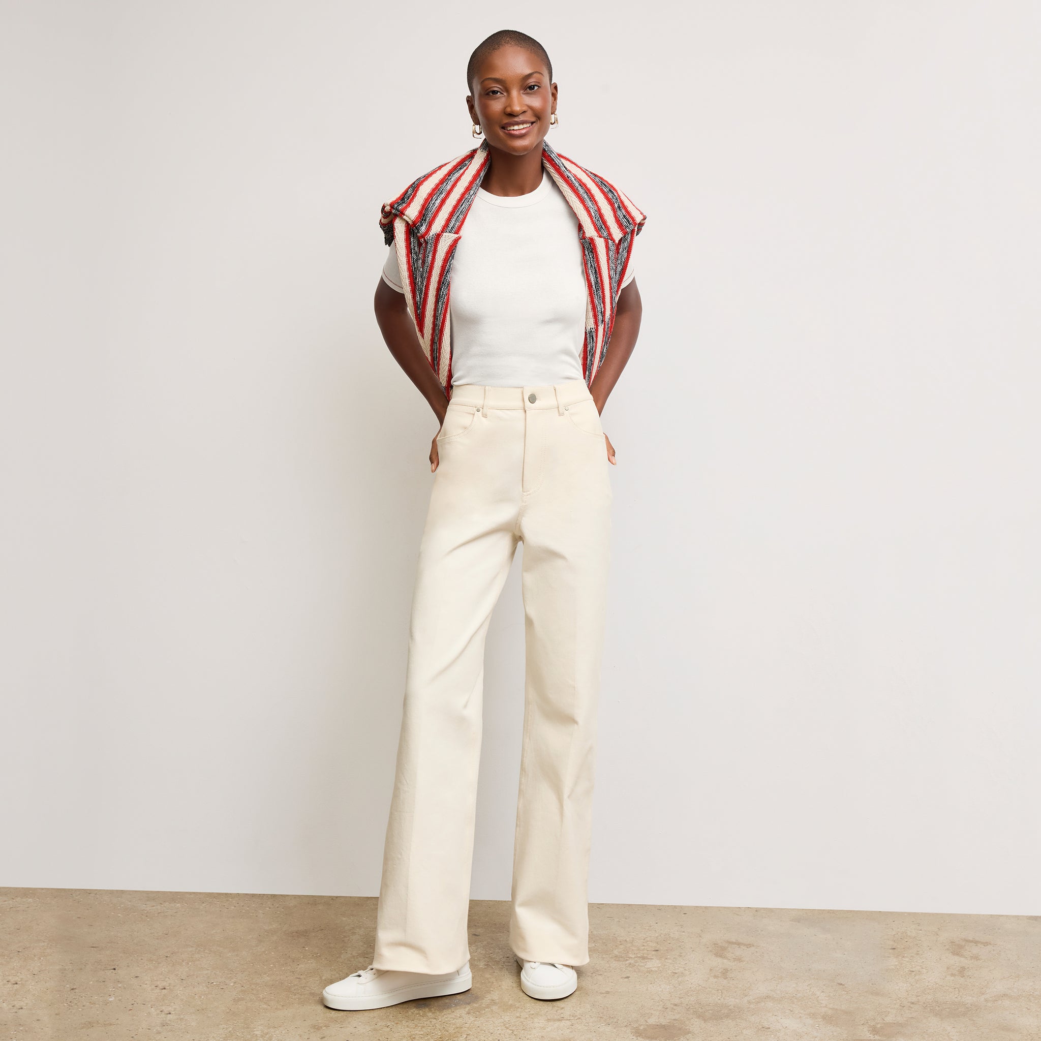 Front image of a woman wearing the Milo Jean in Tusk