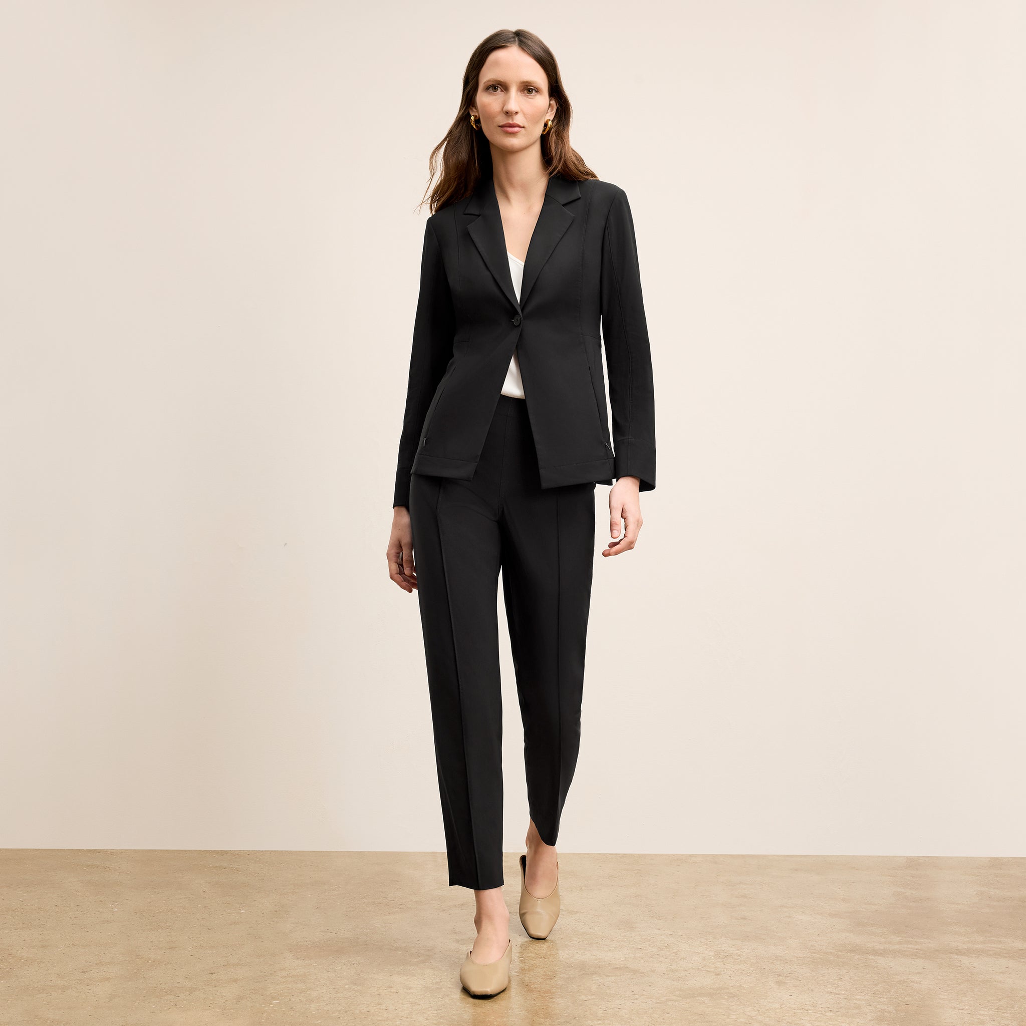 Front image of a woman standing wearing the Colby Jogger in Black