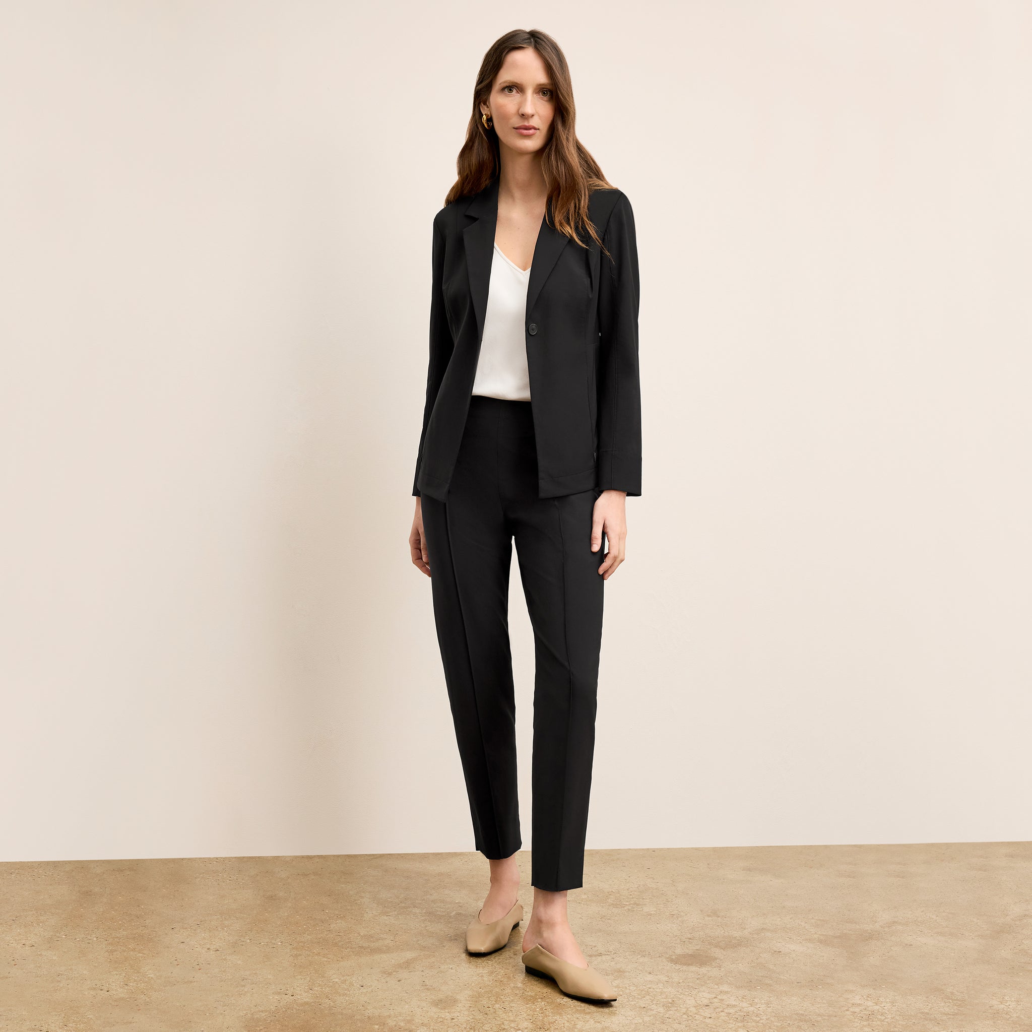 Front image of a woman standing wearing the Colby Jogger in Black