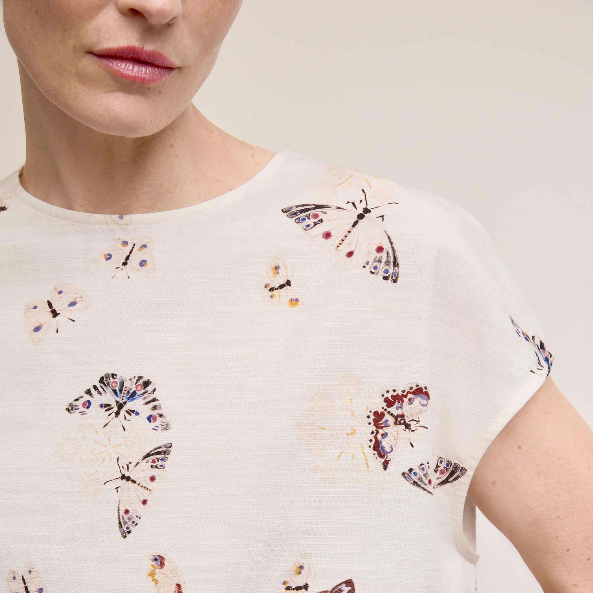 Front image of a woman wearing The Didion Top - Airy Cotton :: Butterfly Print 